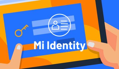 Mi Identity header - Illustration of person holding tablet with login box on screen, Mi Identity title and icon overlayed in white